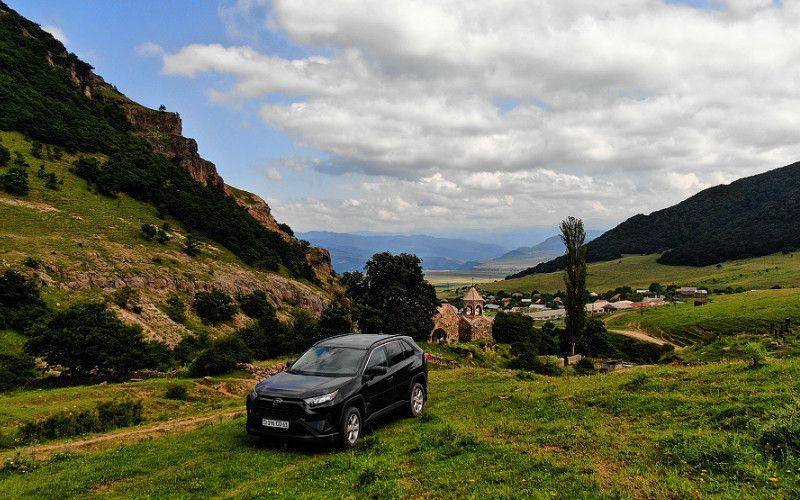 car rental Armenia countryside SUV travel explore nature Caravan journey